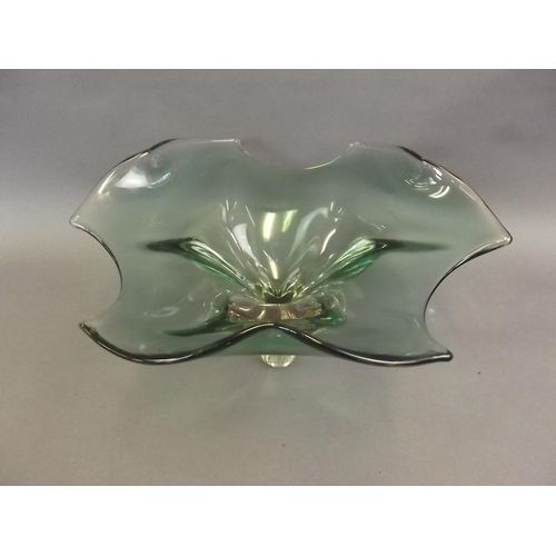 42 - A green Studio glass pedestal fruit bowl shaped as a stylised three leaf clover, 13