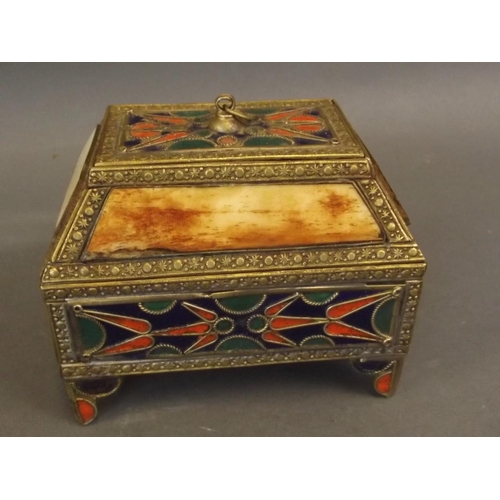 50A - An Eastern sarcophagus shaped brass trinket box with enamelled and applied bone decoration, 4½