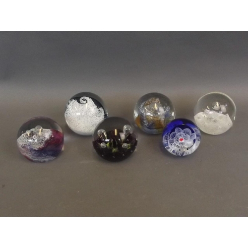 50E - A collection of six Caithness Art glass paperweights including the designs 'Titania', 'Tidal Wave', ... 