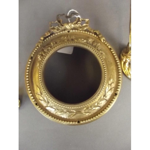 1 - A pair of ornate cast brass two branch candle wall sconces, and a circular brass mount, 13