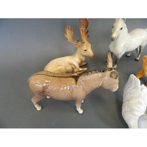 28 - A Beswick porcelain figure of a donkey, a Beswick Welsh grey figure of a pony, a Lladro porcelain fi... 