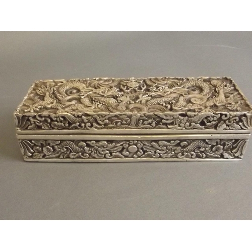 10 - A Chinese white metal scribe's box with incised twin dragon and flaming pearl decoration, 6 characte... 