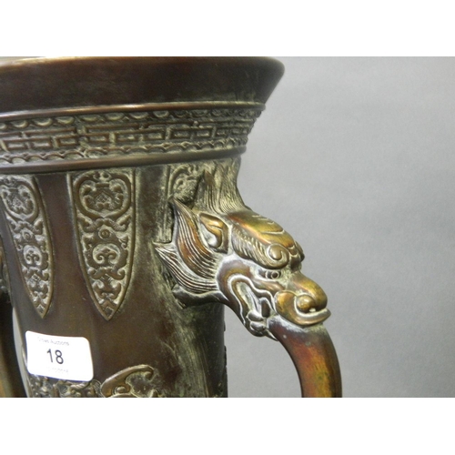 18 - A pair of Meiji bronze vases with dragon handles and raised decoration of a musician under a cypress... 