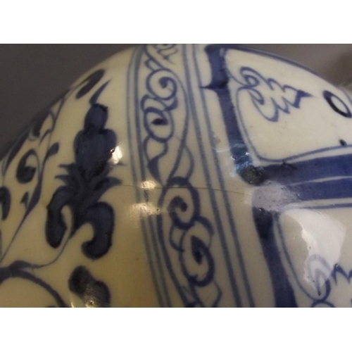 27 - A Chinese Yuan style blue and white porcelain pear shaped vase with lotus flower decoration, 10½