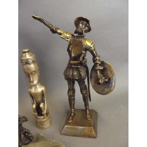 29 - A bronze figure of a Conquistador, together with an African bronze figure of a seated man, a small b... 