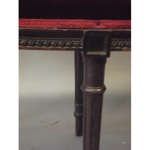 839 - A C19th mahogany window seat with lamb's tongue decorated frieze, raised on six fluted supports, 38