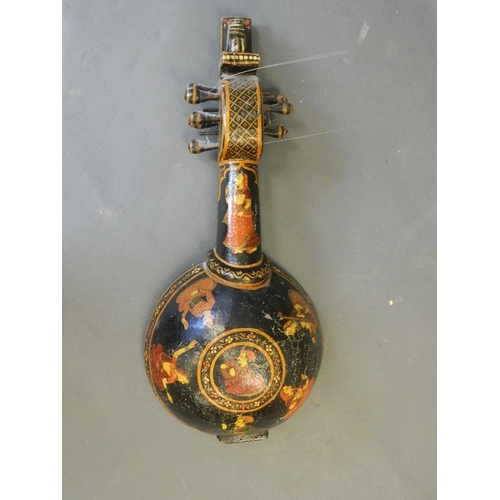 14 - An Indian stringed musical instrument with painted and lacquered decoration, 28