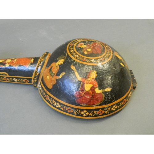 14 - An Indian stringed musical instrument with painted and lacquered decoration, 28