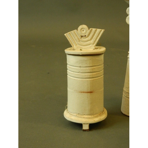 18 - A collection of studio pottery by Terry Burton, including a vase, candlestick and jars, largest 9½