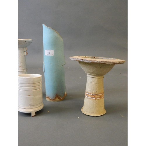 18 - A collection of studio pottery by Terry Burton, including a vase, candlestick and jars, largest 9½