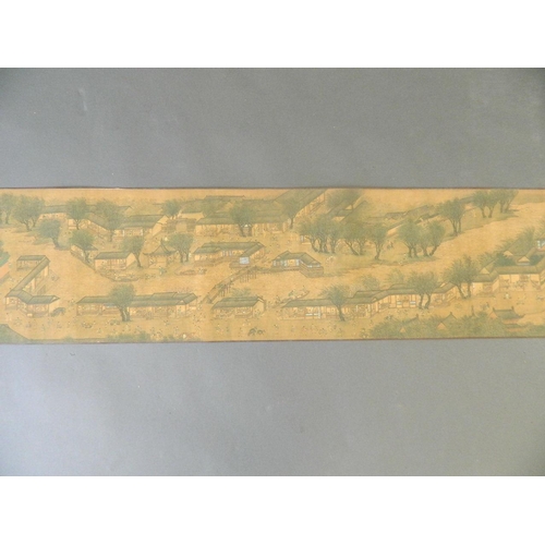 38 - A Chinese printed scroll depicting an extensive landscape with temple complexes, palaces, villages a... 