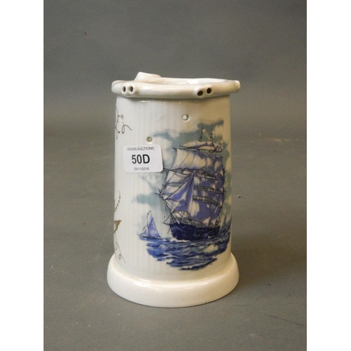 50D - A late C19th Continental porcelain puzzle tankard with lithophane base, revealing a risqué nude, 7