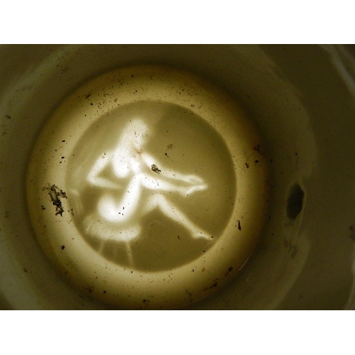 50D - A late C19th Continental porcelain puzzle tankard with lithophane base, revealing a risqué nude, 7