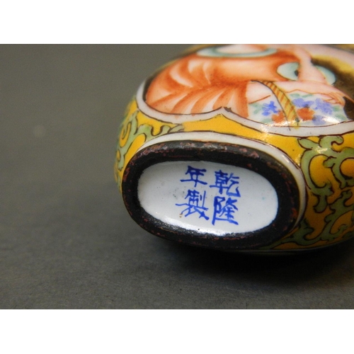 50E - A Cantonese enamel snuff bottle with decoration in the European taste, 4 character mark to base, 3