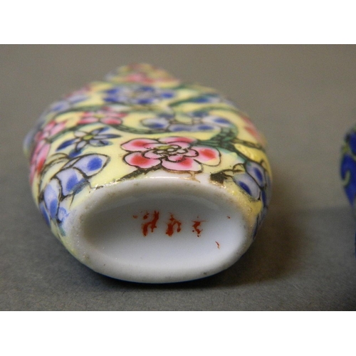 50J - A Chinese porcelain snuff bottle of waisted form with enamel glaze and stylised lotus decoration, 3 ... 