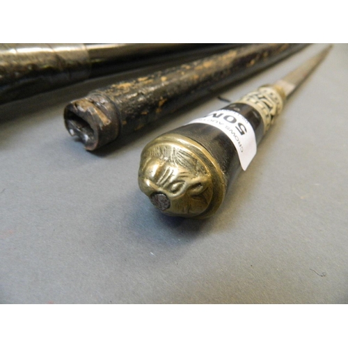 50M - An Indian bone and brass mounted sword stick, and four other walking sticks