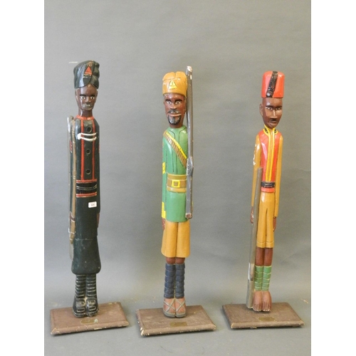 50X - Three carved and painted wood figures of African soldiers, 'The Napier Rifles 1905', 'Somaliland Cam... 