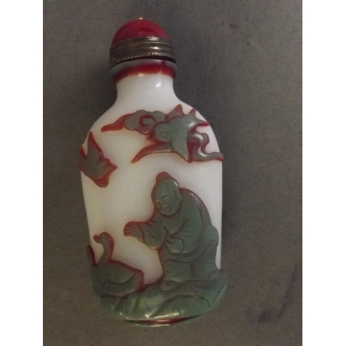 7 - A Peking glass snuff bottle with carved decoration of children, birds and bats, 3