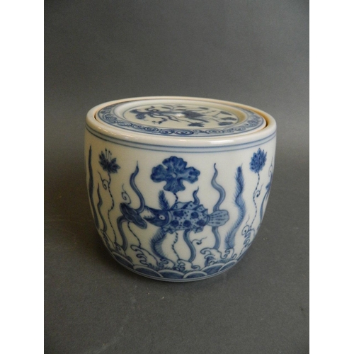 12 - A Chinese porcelain pot and cover with painted carp and water flora decoration, 6 character mark to ... 