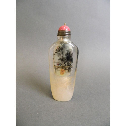 20 - A Chinese crystal snuff bottle with reverse painted decoration of fishermen, 3½