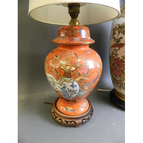 23 - A collection of three Chinese porcelain vases with foliate and temple scene enamel decoration, conve... 