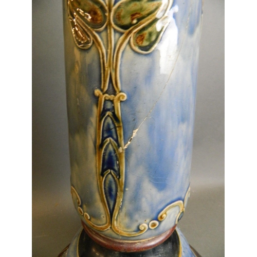 38 - A Doulton pottery jardinière stand with raised enamel floral decoration, 27½