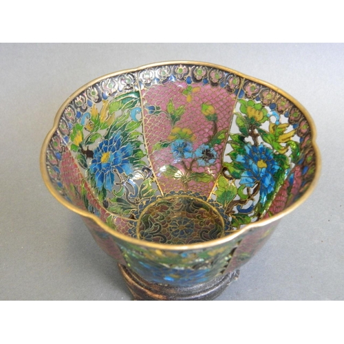 41 - A Chinese plique-à-jour petal shaped bowl with alternate pink ground and pierced decoration of flowe... 