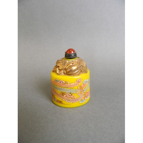 50 - A Peking glass snuff bottle with enamelled phoenix decoration on a yellow ground, 2