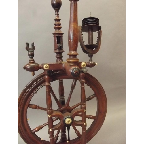 50C - A C19th mahogany spinning wheel with ivory mounts and ivory ball feet, 40