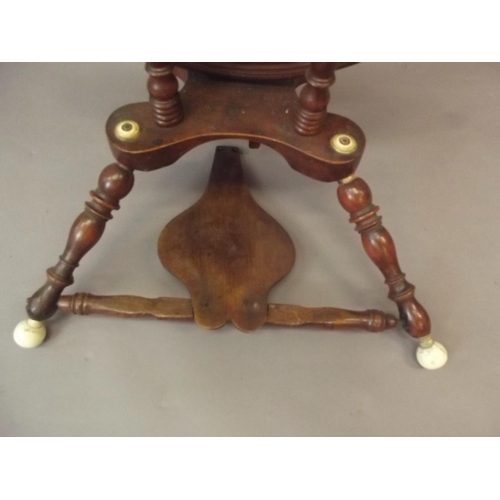 50C - A C19th mahogany spinning wheel with ivory mounts and ivory ball feet, 40