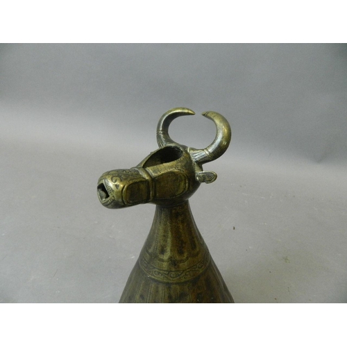 50Q - An antique Middle Eastern bronze pourer in the form of a bull, 10