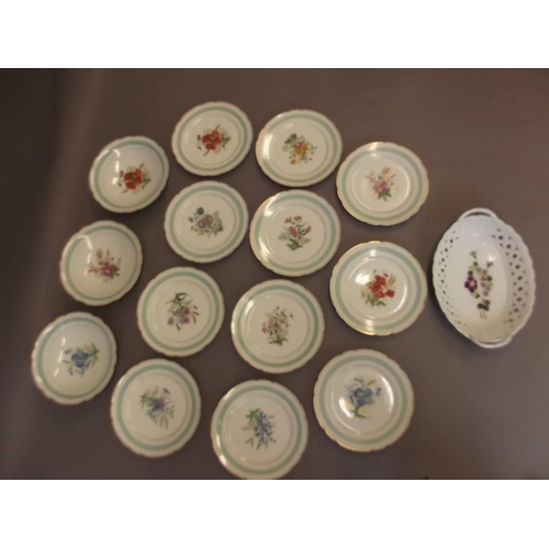 50X - A C19th porcelain dessert service comprising three pedestal tazzas and eleven plates decorated with ... 