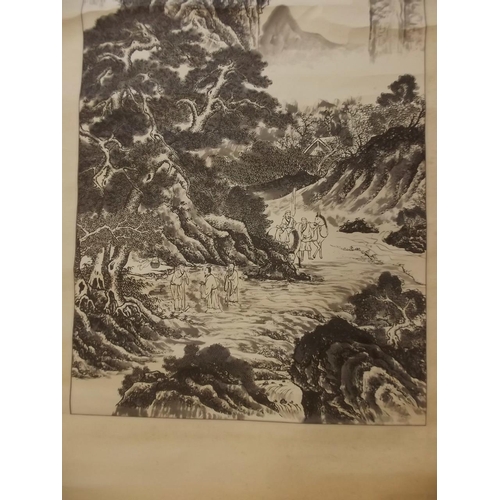 50Y - A Chinese black and white scroll depicting travellers in a mountain landscape, signed in calligraphy... 