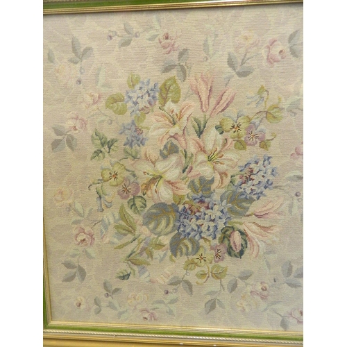 8 - A framed wool work of a floral bouquet, 23