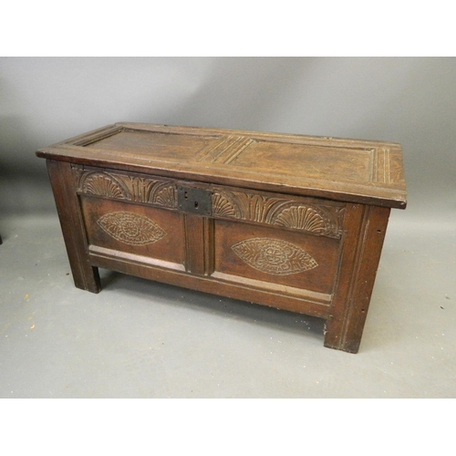 871 - A good late C17th oak panelled coffer of small proportions, with carved panels and frieze, panelled ... 