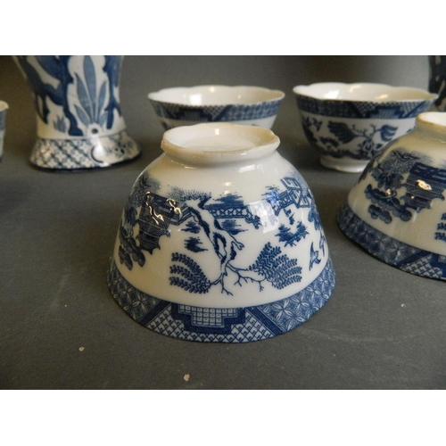 9 - A pair of English blue and white porcelain jars decorated with Asiatic pheasants, together with six ... 