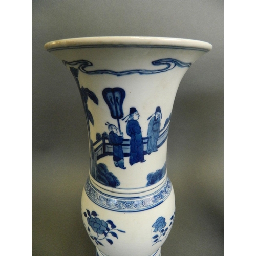 106 - A pair of Chinese blue and white porcelain Gu shaped vases decorated with scenes of an emperor and h... 