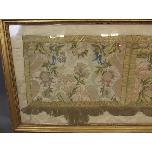 112 - A C19th floral embroidery with a gold thread fringe, framed, 49