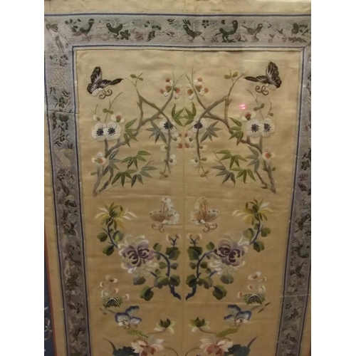 125 - A late C19th Chinese silk embroidery of butterflies amongst flowers, 16