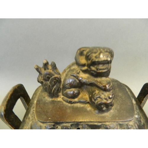 133 - A Chinese cast iron incense burner with twin handles and Fo dog knop, 9