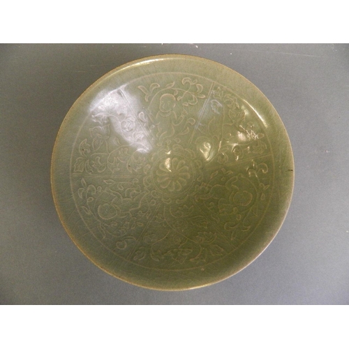 170 - A Chinese Song style green glazed pottery dish with incised decorative panel of boys and flowers, 7