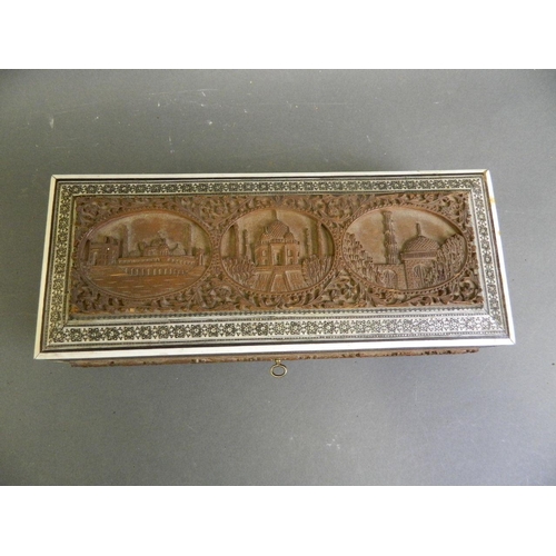 172 - An Indian micro-mosaic glove box with carved hardwood decorative panels depicting the Taj Mahal, 12