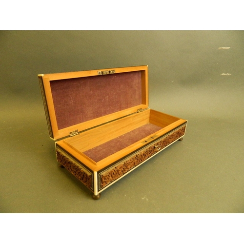 172 - An Indian micro-mosaic glove box with carved hardwood decorative panels depicting the Taj Mahal, 12