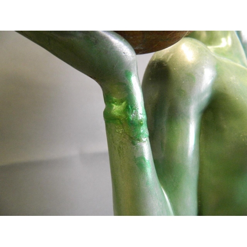 177 - An Art Deco composition lamp in the form of a female nude with applied green patina, 26½