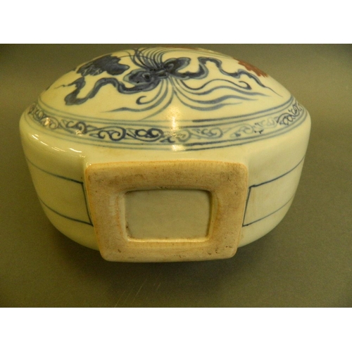 187 - A Chinese twin handled blue and white porcelain moon flask with painted lotus flower decoration and ... 