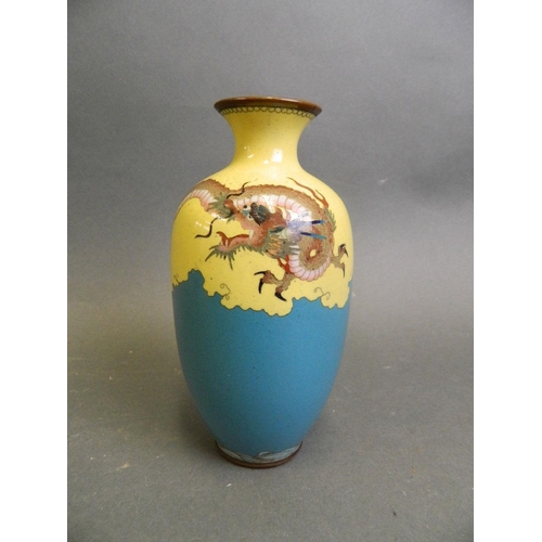 196 - A Japanese Meiji cloisonné vase decorated with a dragon in flight over a sea, 6