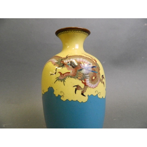 196 - A Japanese Meiji cloisonné vase decorated with a dragon in flight over a sea, 6