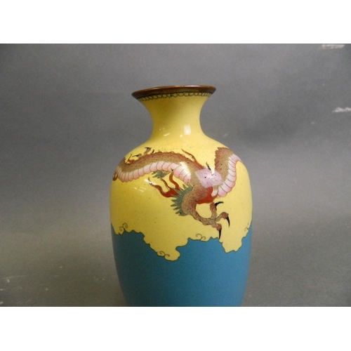 196 - A Japanese Meiji cloisonné vase decorated with a dragon in flight over a sea, 6