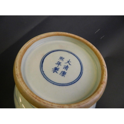 202 - A Chinese blue and white porcelain footed vase decorated with an extensive riverside village, 6 char... 