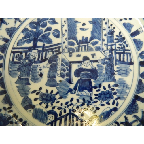 215 - A Chinese blue and white porcelain charger with painted decoration of an emperor and his court, 11